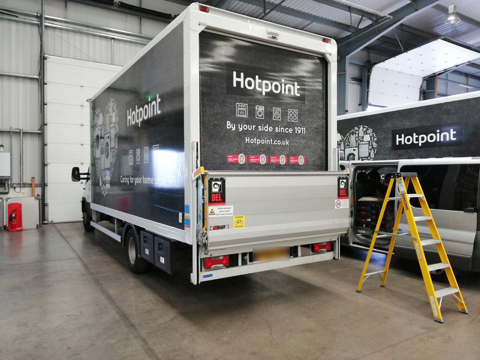 Box van wrapped in full vinyl graphics